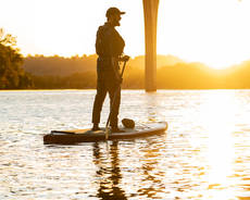 Photo of person on standing paddle board